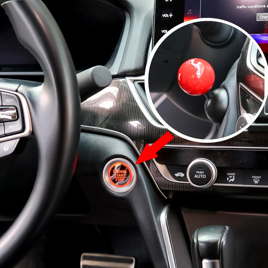 Ball design cover fitted on a car push start engine button, view 2