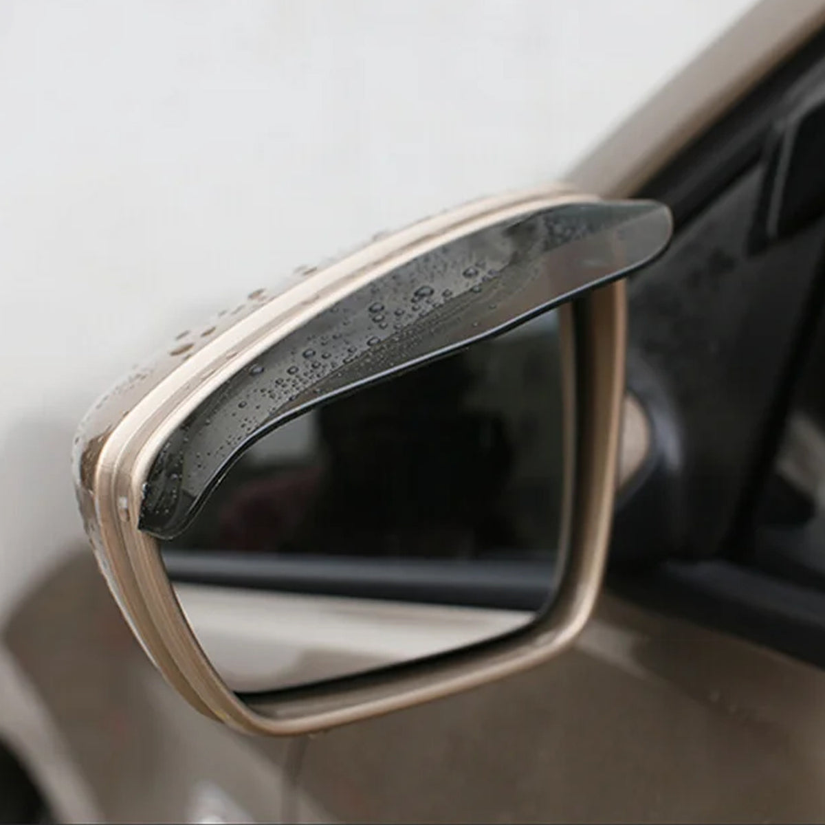 Pair of black rain guard visors fitted above car side mirrors, view 5