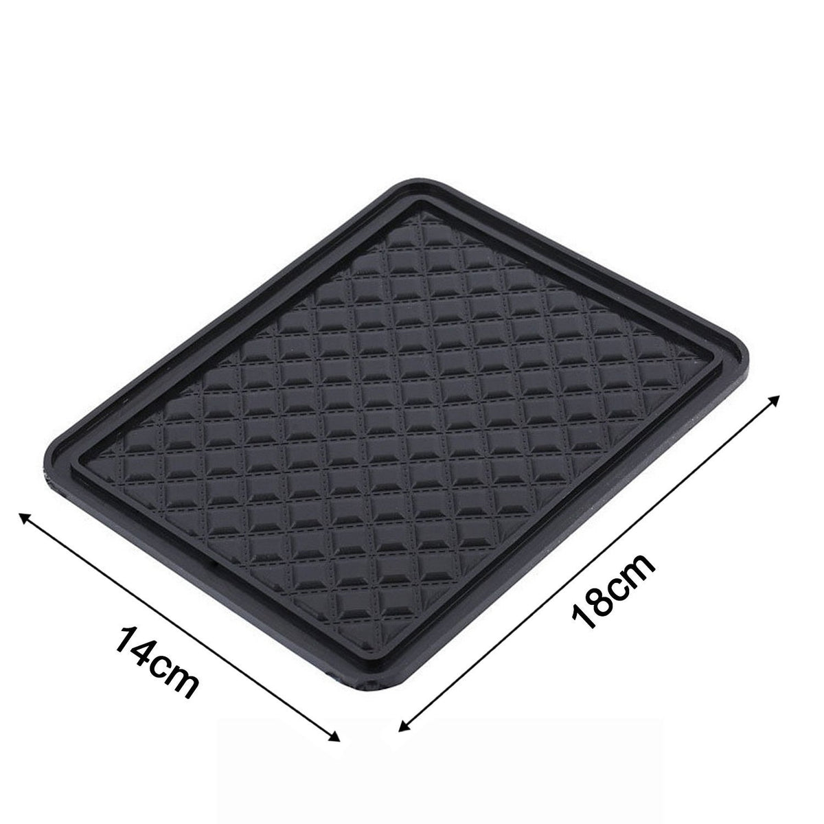 Black anti-slip gel mat on a car dashboard holding a phone and keys, view 3