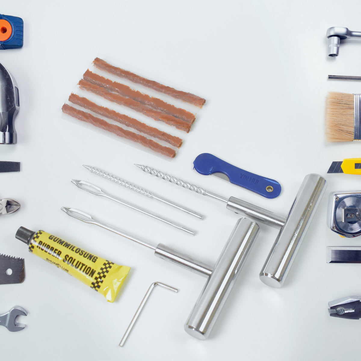 13-piece tubeless tyre puncture repair kit with rasp tool, needle and strings in a box, view 4