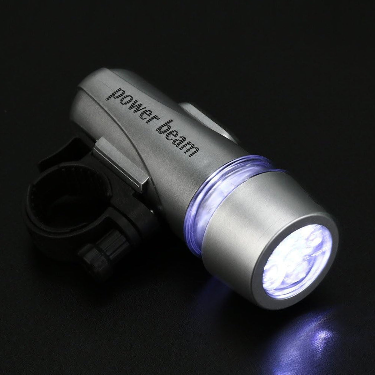 Compact LED bicycle headlight on an adjustable handlebar mount, view 5