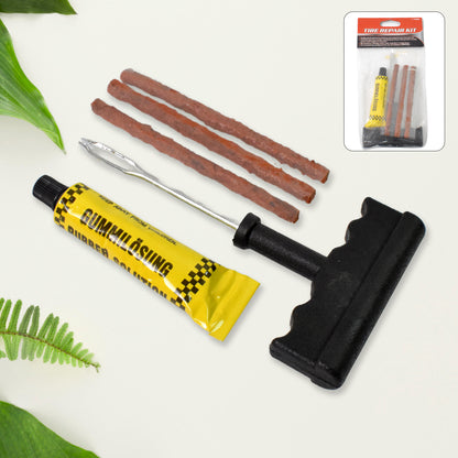Tyre puncture repair kit with T-handle plugger, rubber solution and seal strips