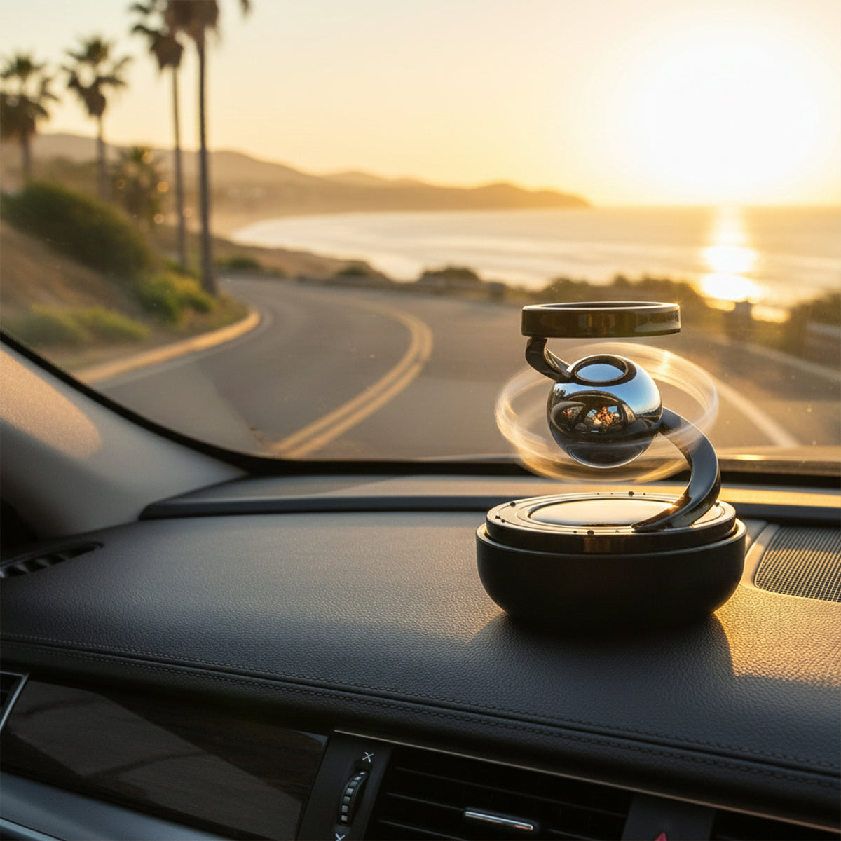 Solar rotating car air freshener with metallic spinning orb on dashboard, view 5