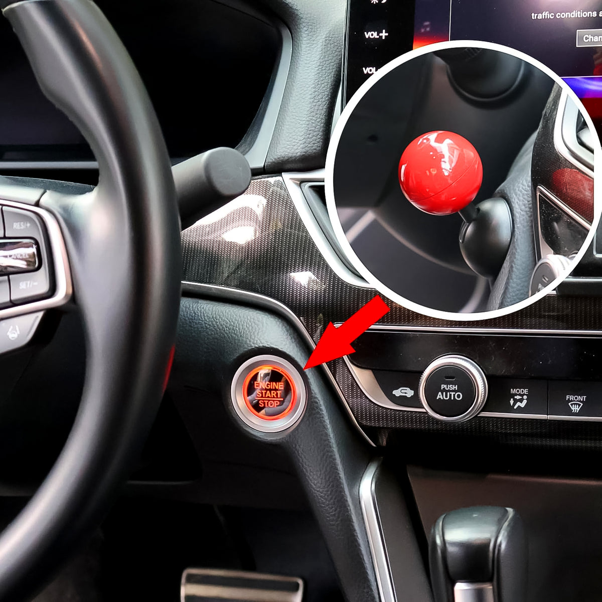 Ball design cover fitted on a car push start engine button, view 2