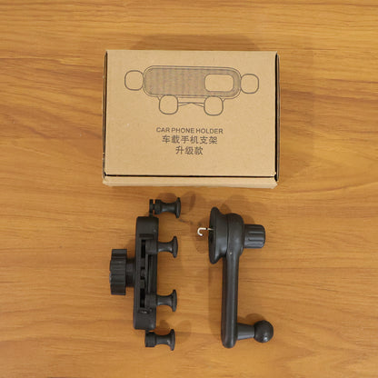 Car air vent phone holder with grip arms holding a smartphone, view 6