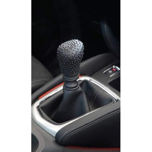 Soft silicone cover fitted on a car gear shift knob
