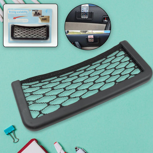 Stick-on mesh storage pocket holding a phone on a car seat side