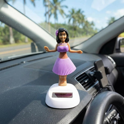 Solar powered dancing hula girl doll in purple dress on car dashboard, view 5