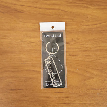 Rectangular metal Jay Sonal Ma keychain with trishul engraving, view 6