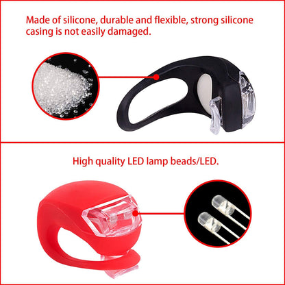 Two small silicone LED bicycle lights, front white and rear red, view 3