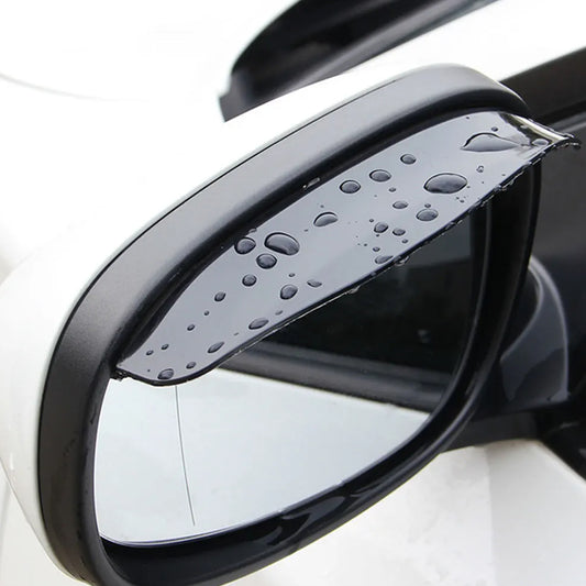 Pair of black rain guard visors fitted above car side mirrors, view 2
