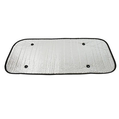 Foldable silver foil sun shade behind a car windshield, view 3