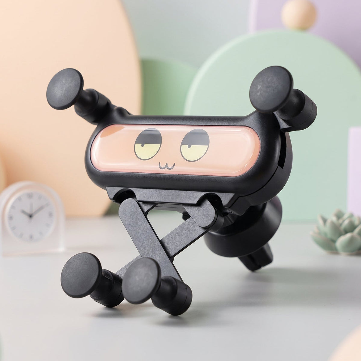 Cute decorative car phone holder clipped to an air vent, view 3
